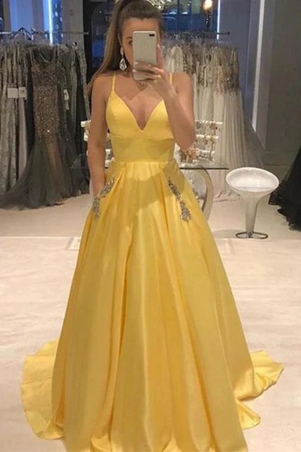 prom dresses with lace appliquésElegant Yellow Spaghetti Straps A Line Satin V Neck Prom Dresses With Beads Pockets